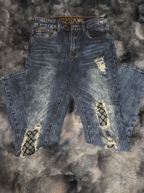 Distressed Blue Women’s Jeans with Patch Fishnet Detail